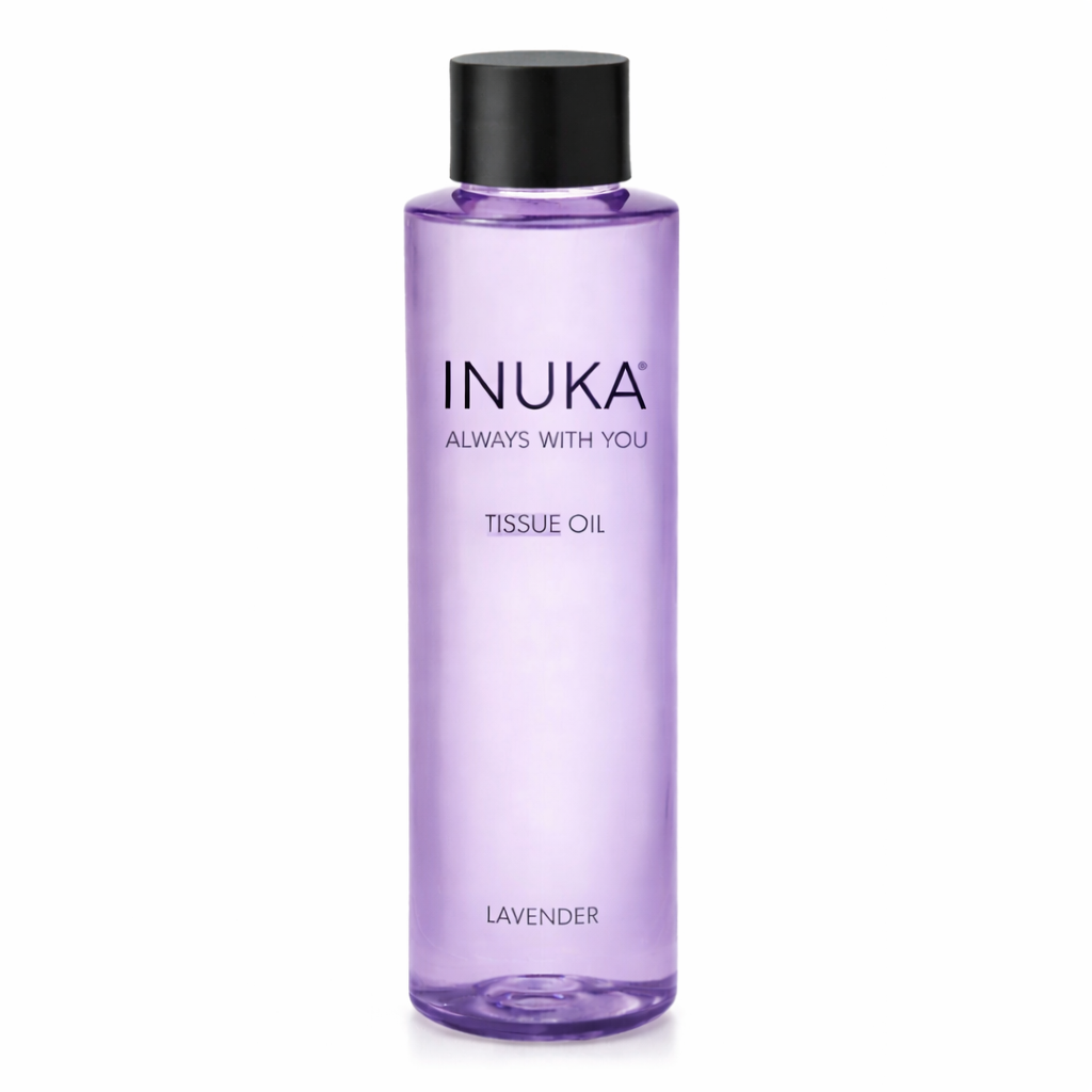 Purple bottle of INUKA lavender tissue oil on a white background