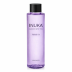 Purple bottle of INUKA lavender tissue oil on a white background